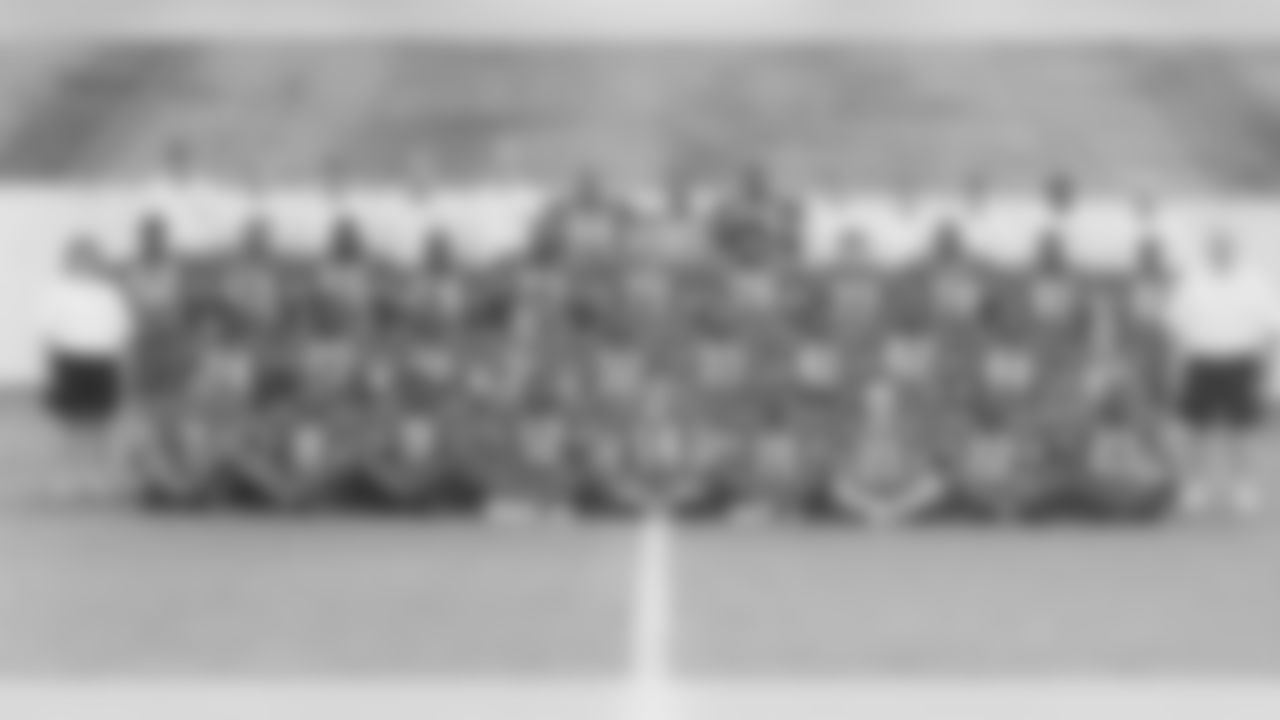 The Andrews football team, with Wilson wearing No. 9.
