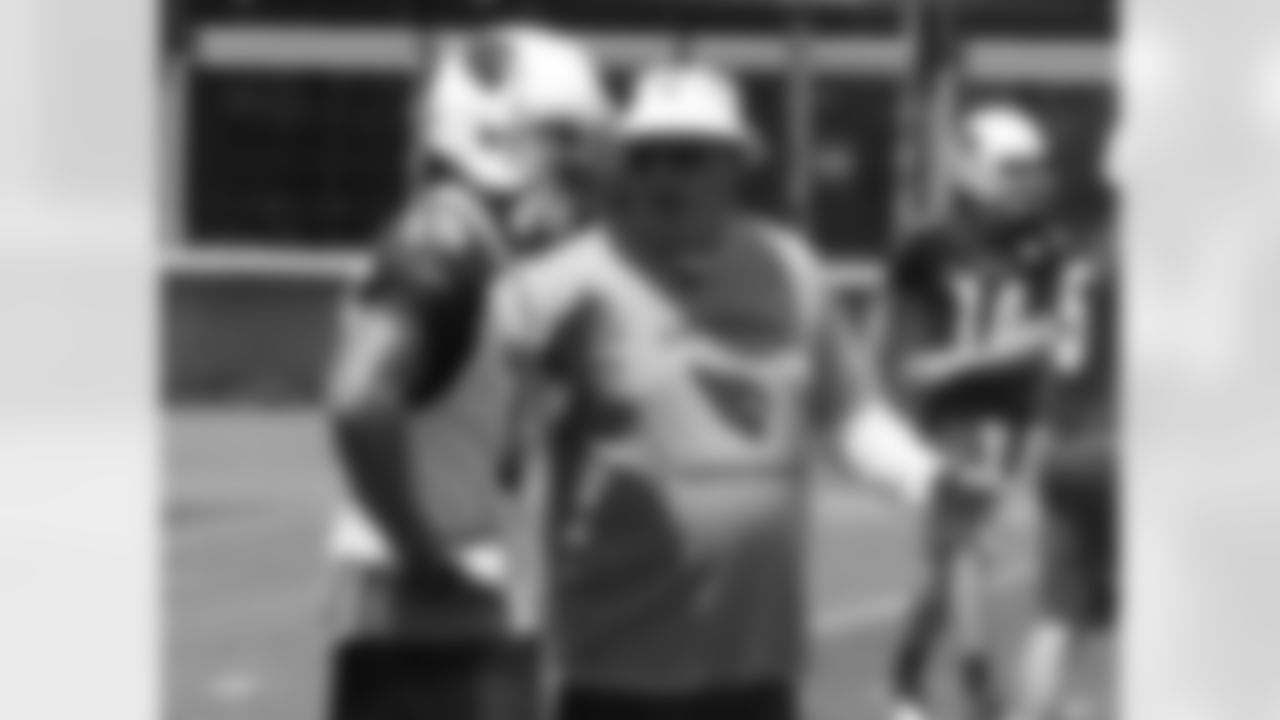 Bruce Arians talks to Michael Floyd