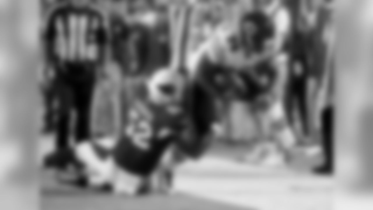 LB Zaviar Gooden holds on