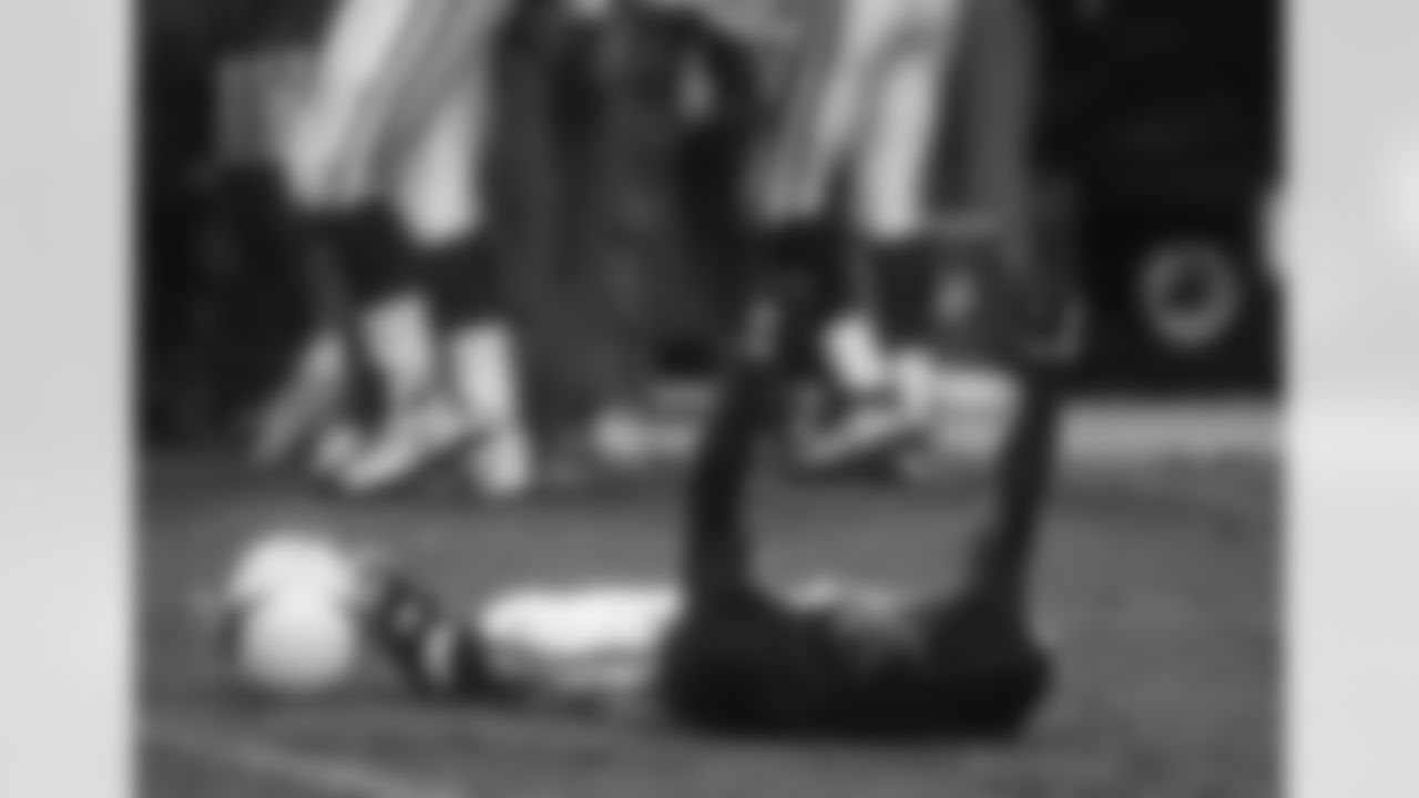 1996: CB Aeneas Williams celebrates a victory over Philadelphia.