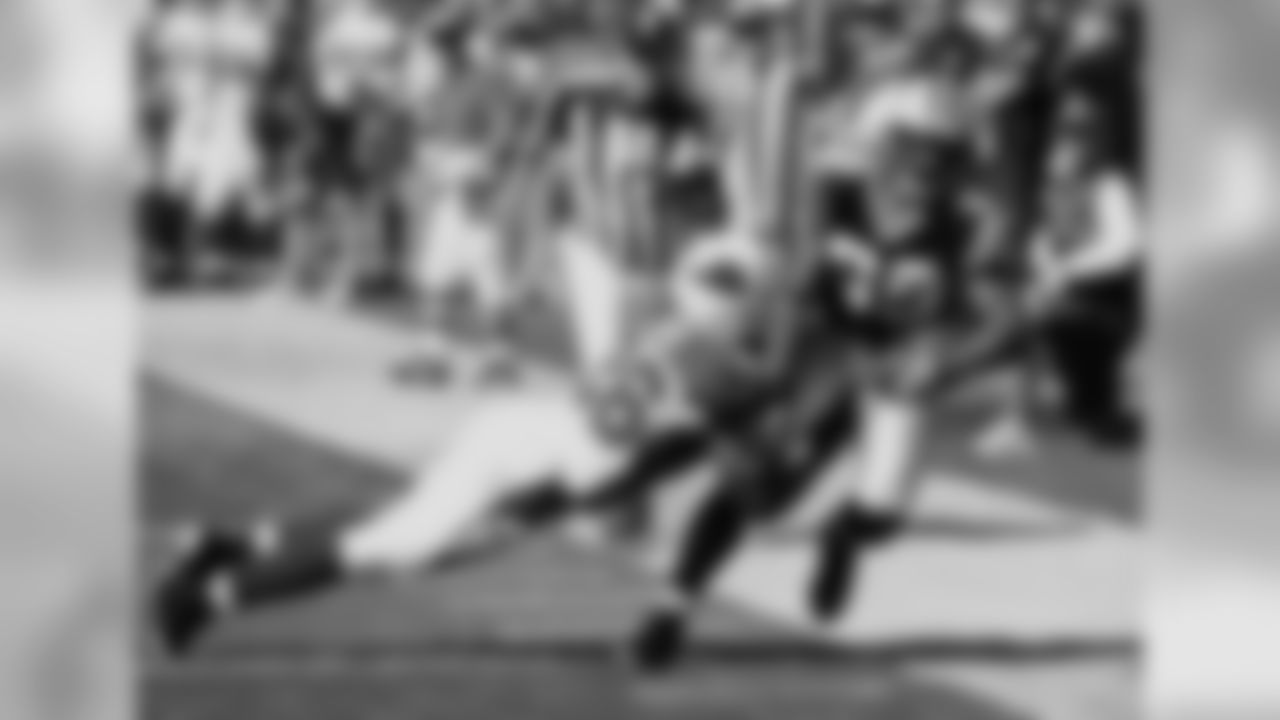 Rod Hood lays a hit on Steve Smith in 2008