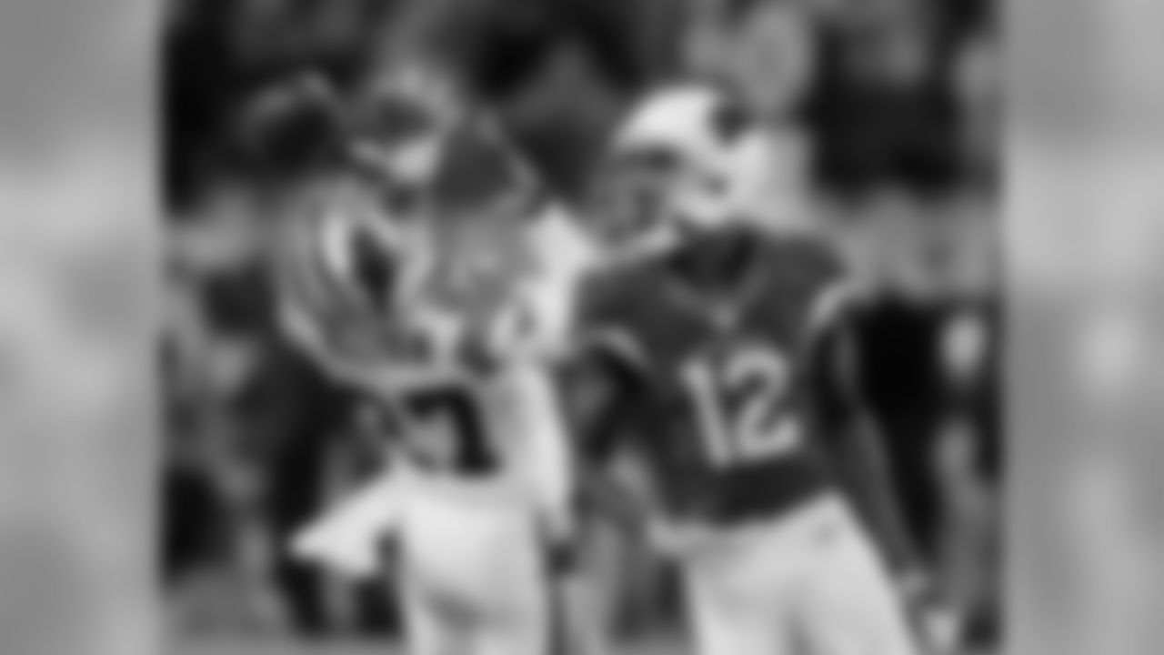 Panthers CB Robert McClain and WR John Brown try to locate a pass