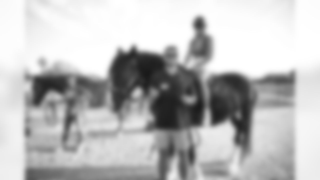 The Arizona Cardinals visit Hunkapi Farms to work with therapy horses and families with ALS on Saturday, May 13, 2023 in Scottsdale, AZ.