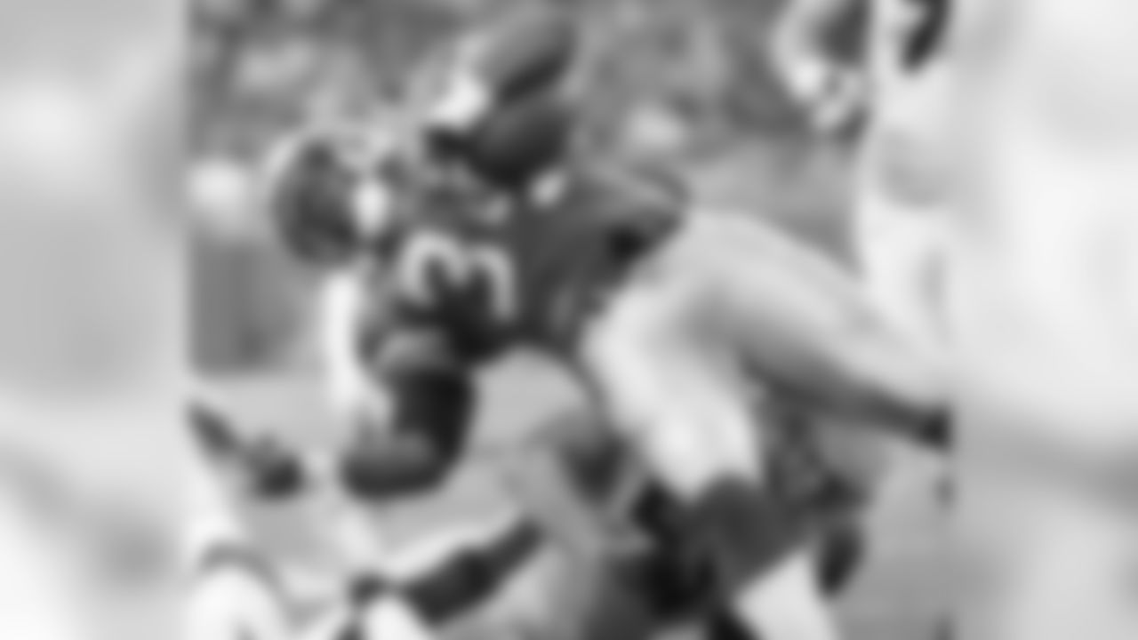 2005: Cardinals LB James Darling tackles Lions RB Kevin Jones
