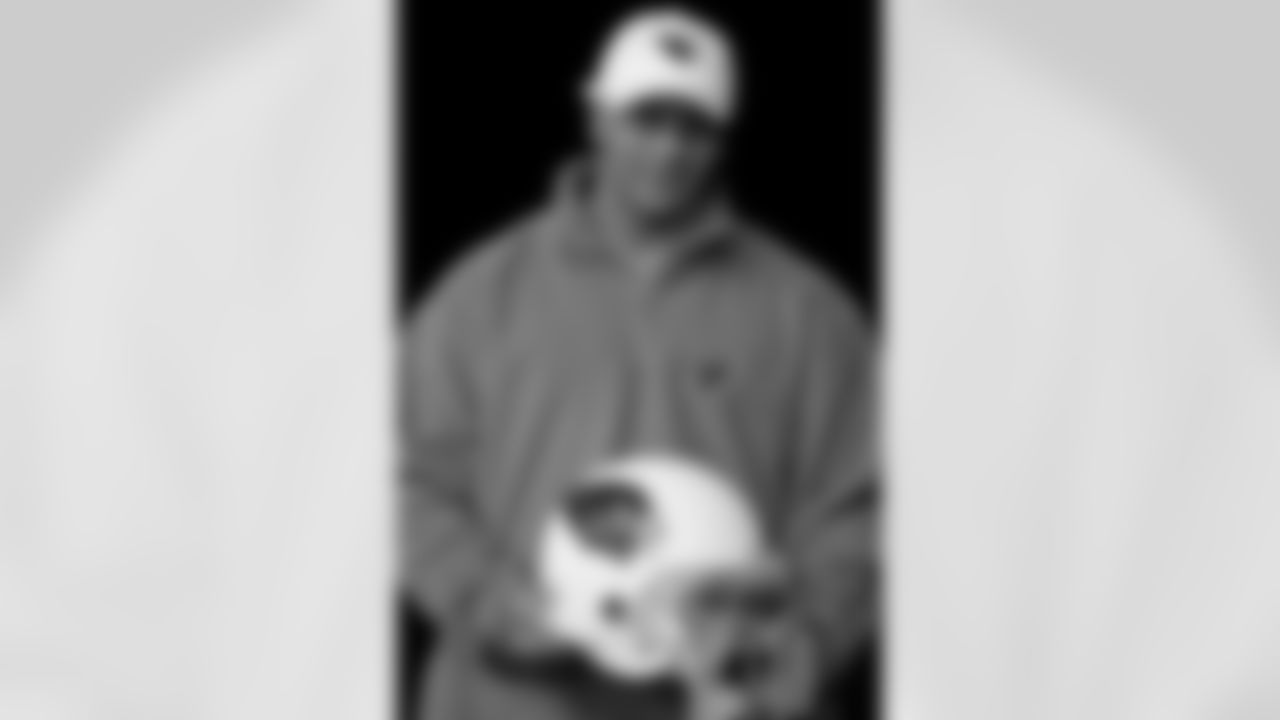 RB Marcel Shipp shows off the new logo in 2005