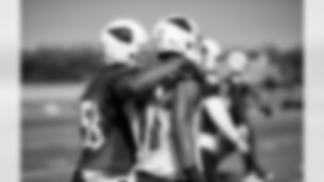Friendly: Daryl Washington and LaRon Byrd