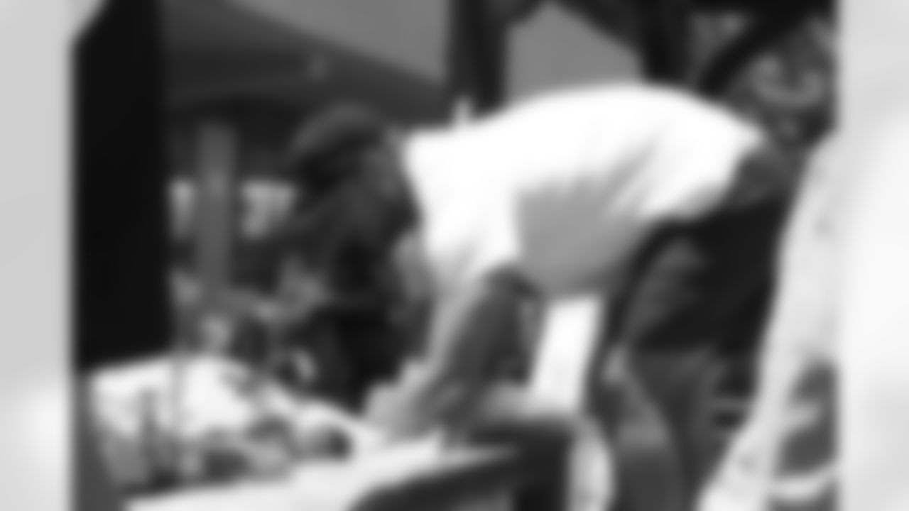 The Arizona Cardinals volunteer the Center of Opportunity homeless shelter with the University of Arizona football team during the Cardinals Caravan on Tuesday, June 1, 2023 in Tucson, AZ.