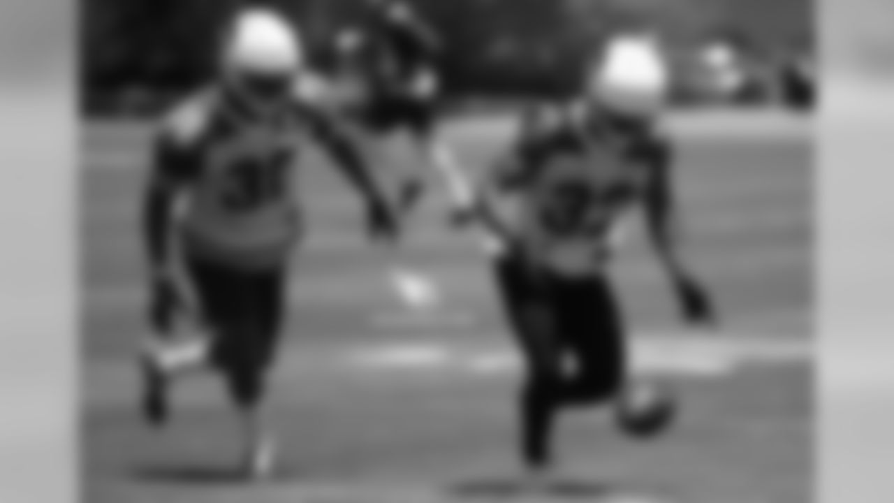 S Rudy Ford (left) and CB Lou Young III