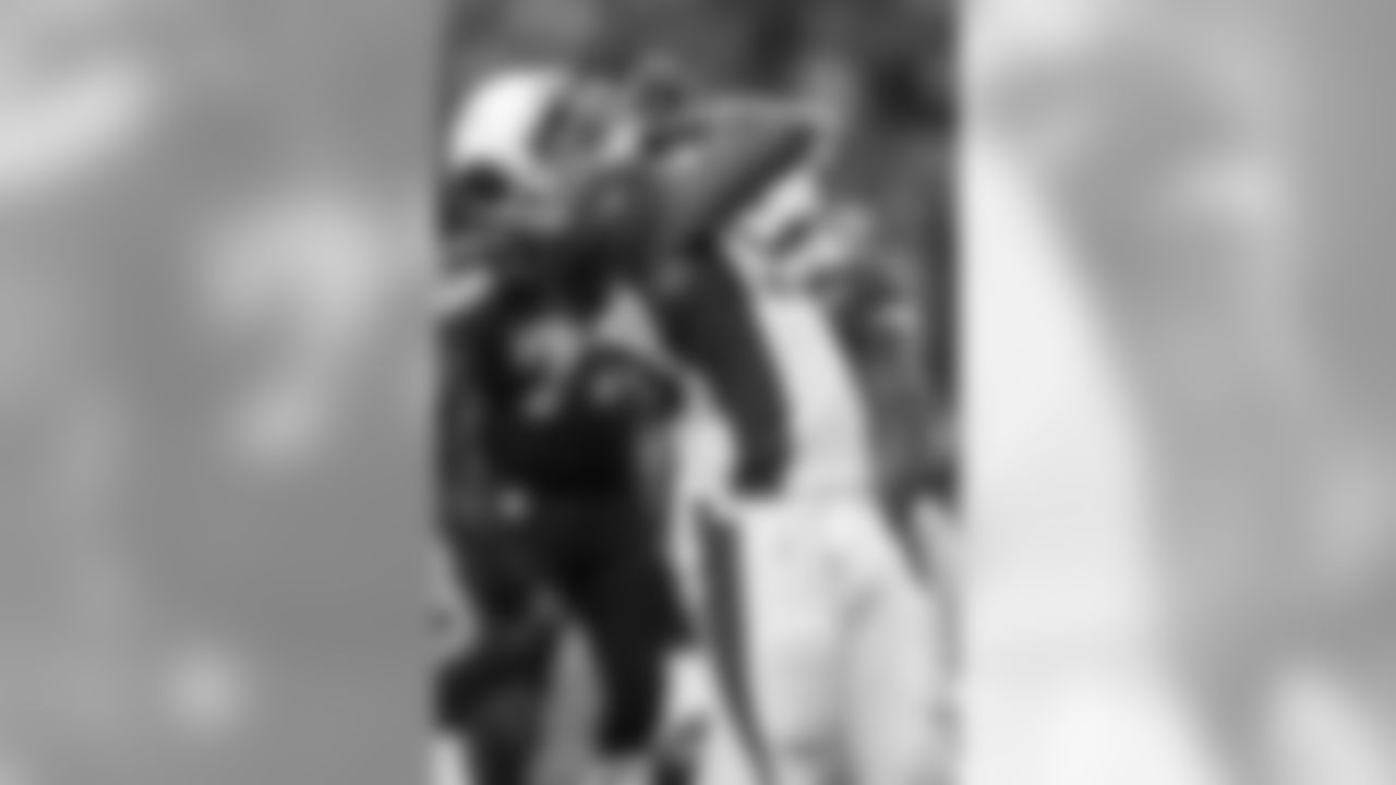 DE Calais Cambell celebrates a sack in Seattle.