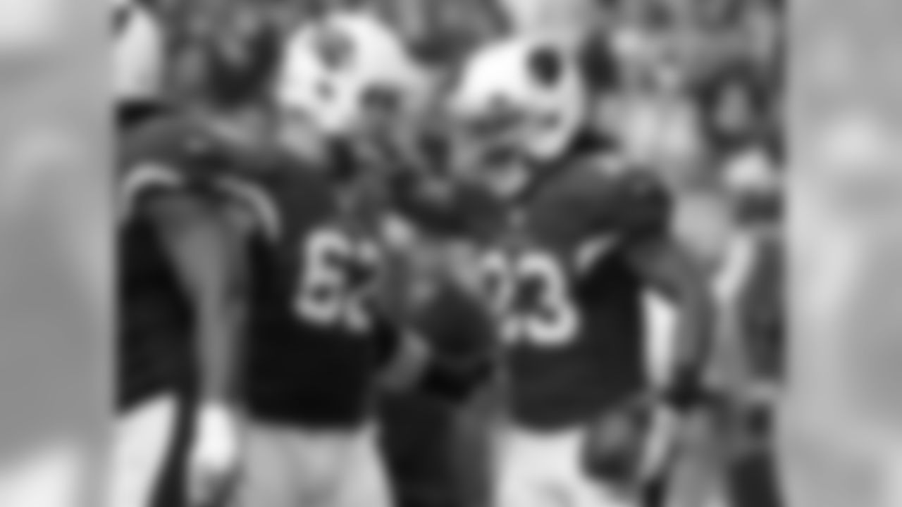 RB Chris Johnson and G Ted Larsen celebrate a touchdown