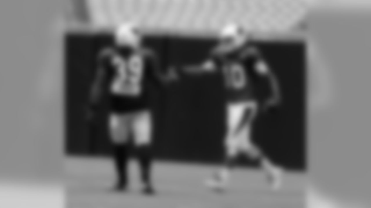 FB Robert Hughes congratulates WR Brittan Golden on a TD.