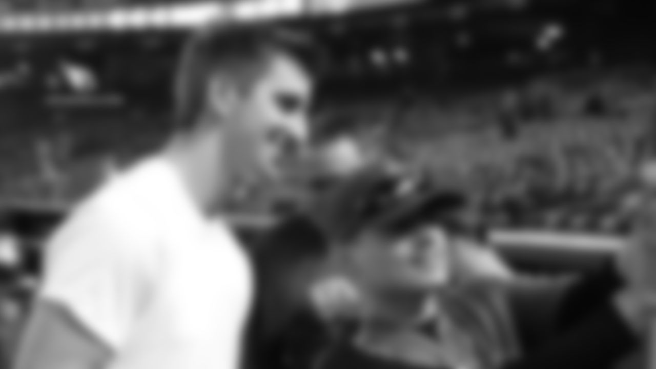 QB Josh Rosen takes a selfie with a fan