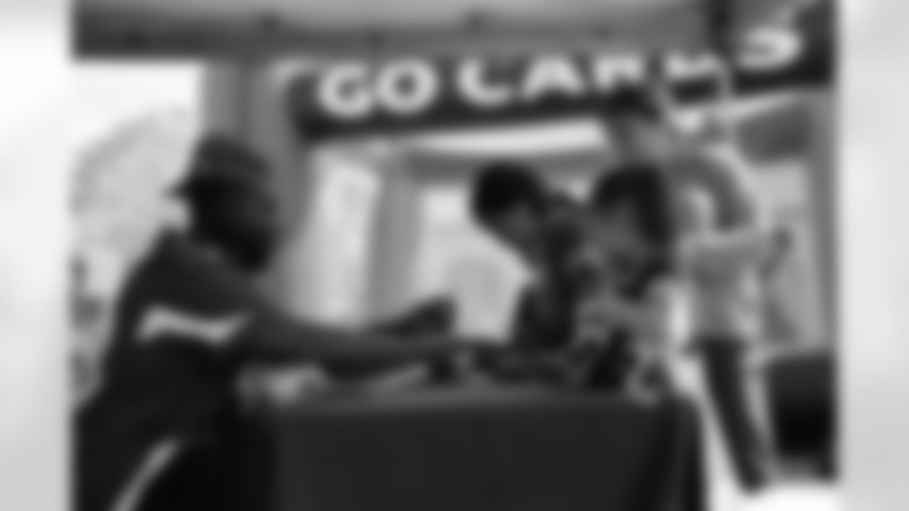 The Arizona Cardinals host Women's Wellness Day at Phoenix Rescue Mission's Changing Lives Center featuring free health screenings by Cigna and a woman-owned food truck Wok This Way on Saturday, March 18, 2023.