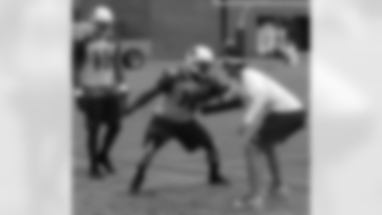 WR Jaron Brown works on getting off the press