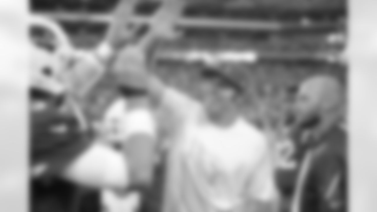 QB Carson Palmer and QB Ryan Lindley high-five during the Colts game.
