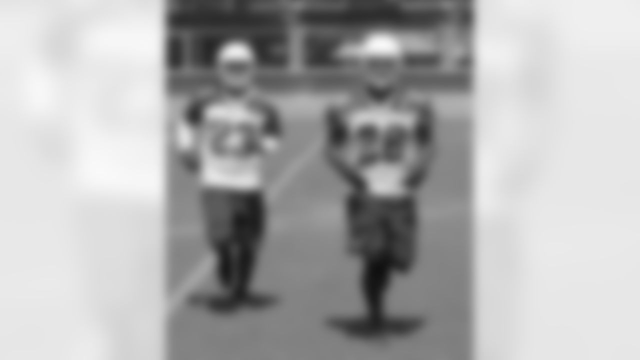 CBs Bryan McCann (23) and Justin Bethel (28)