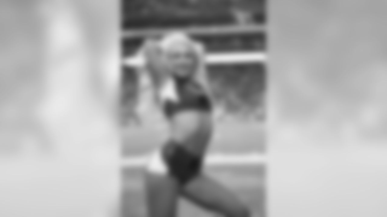 Images of Cardinals cheerleader Davis during the 2019 season