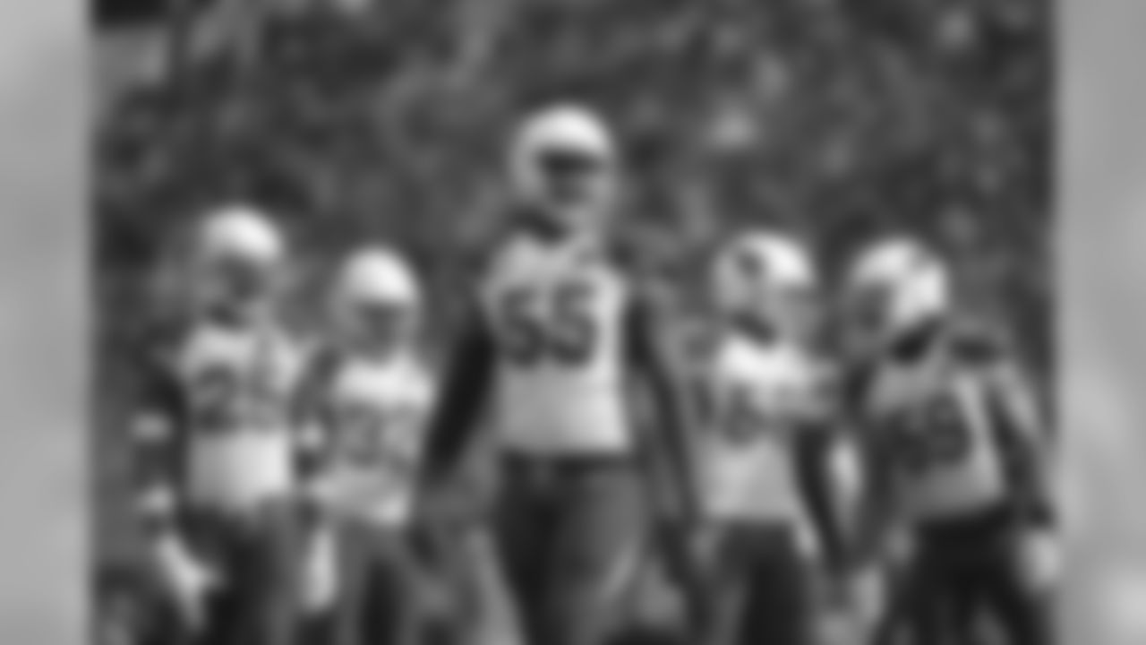 The Cardinals defense led by LB Chandler Jones (center).