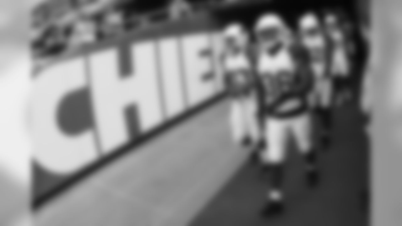Players exit the tunnel