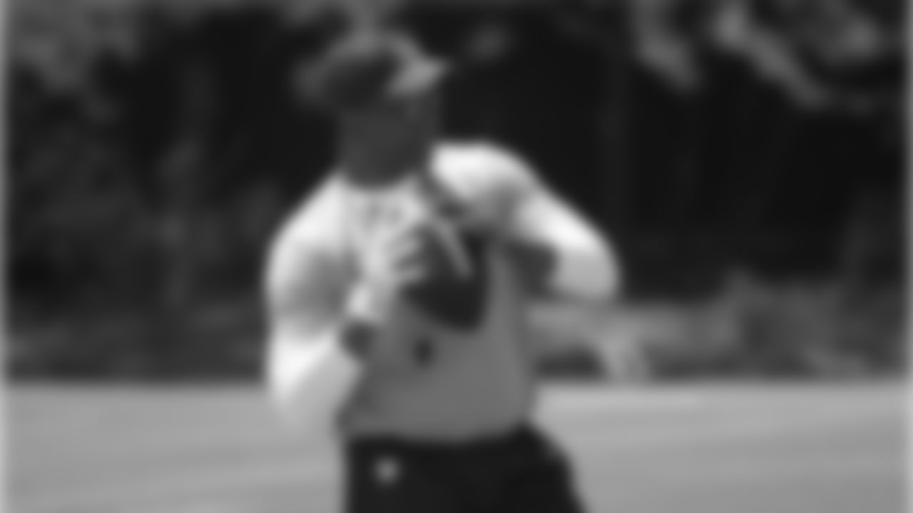 Coach Steve Wilks throws to DBs