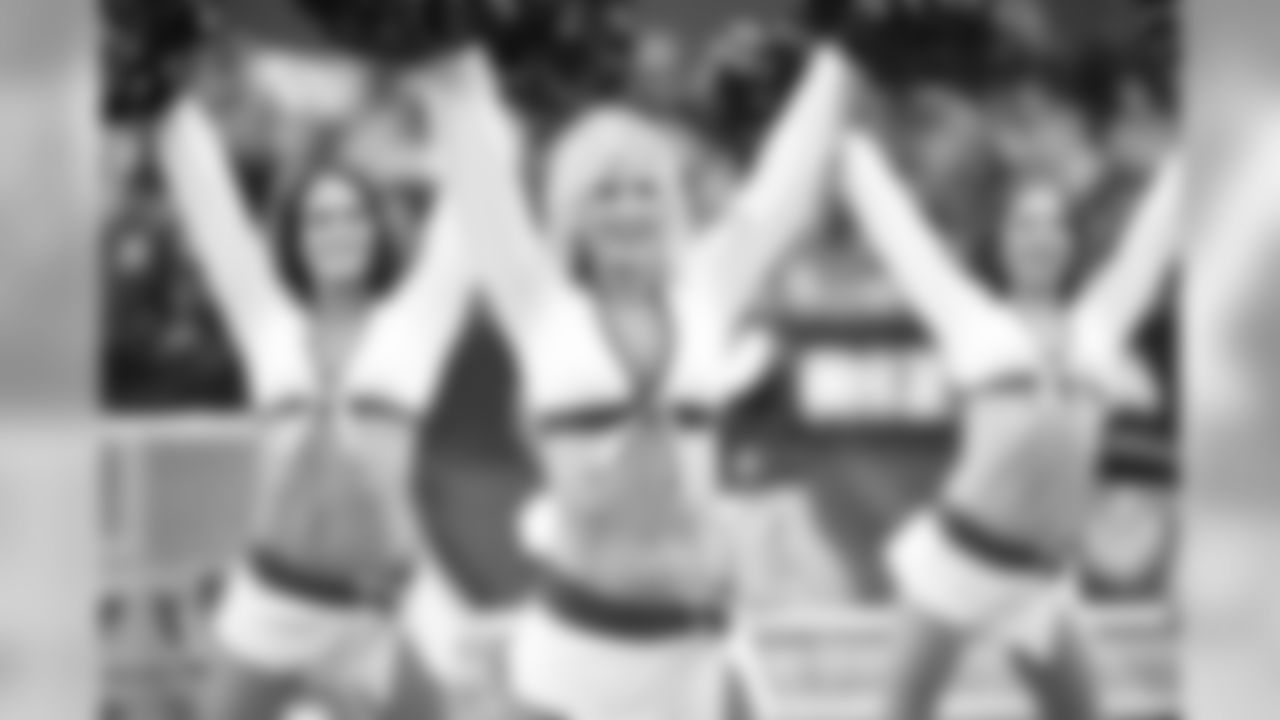 Images of the Cardinals cheerleaders from halftime and other moments at the home opener