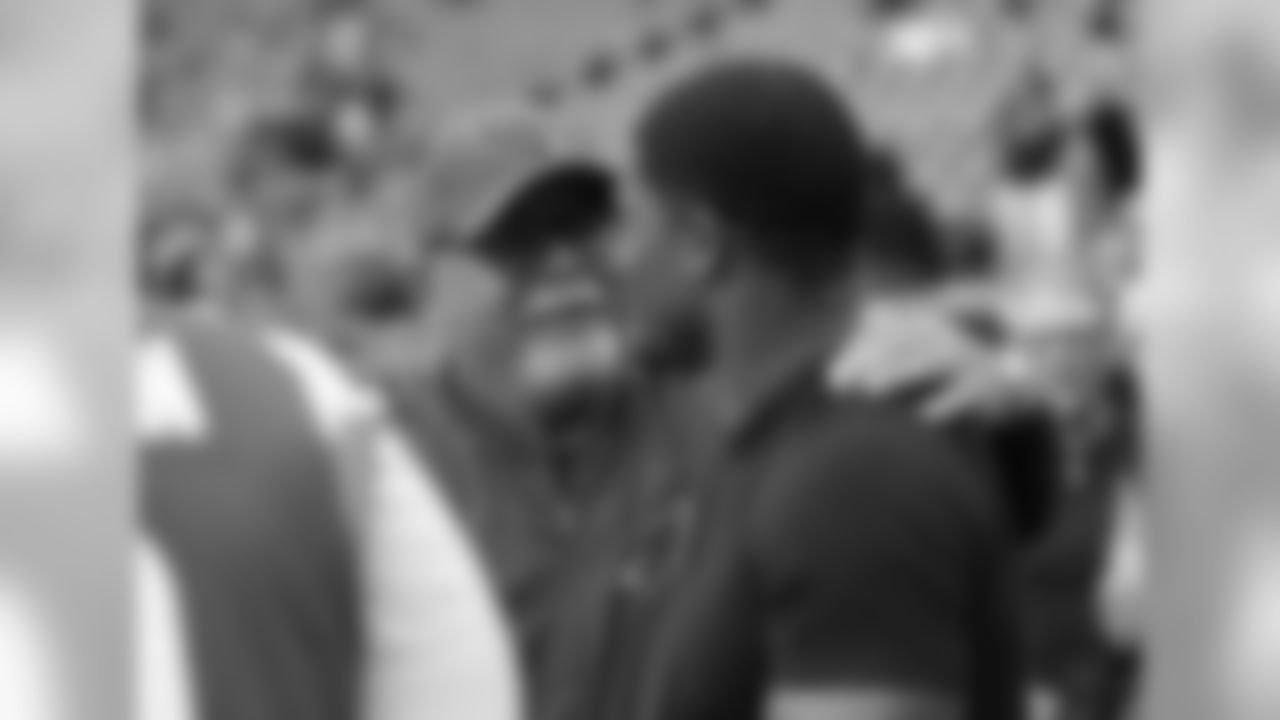 Coach Bruce Arians speaks with former Texans star Andre Johnson