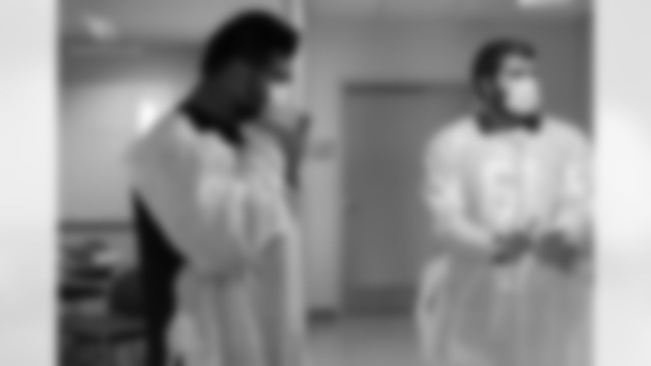 G Mike Iupati (left) and G Cole Toner prepare to visit a patient