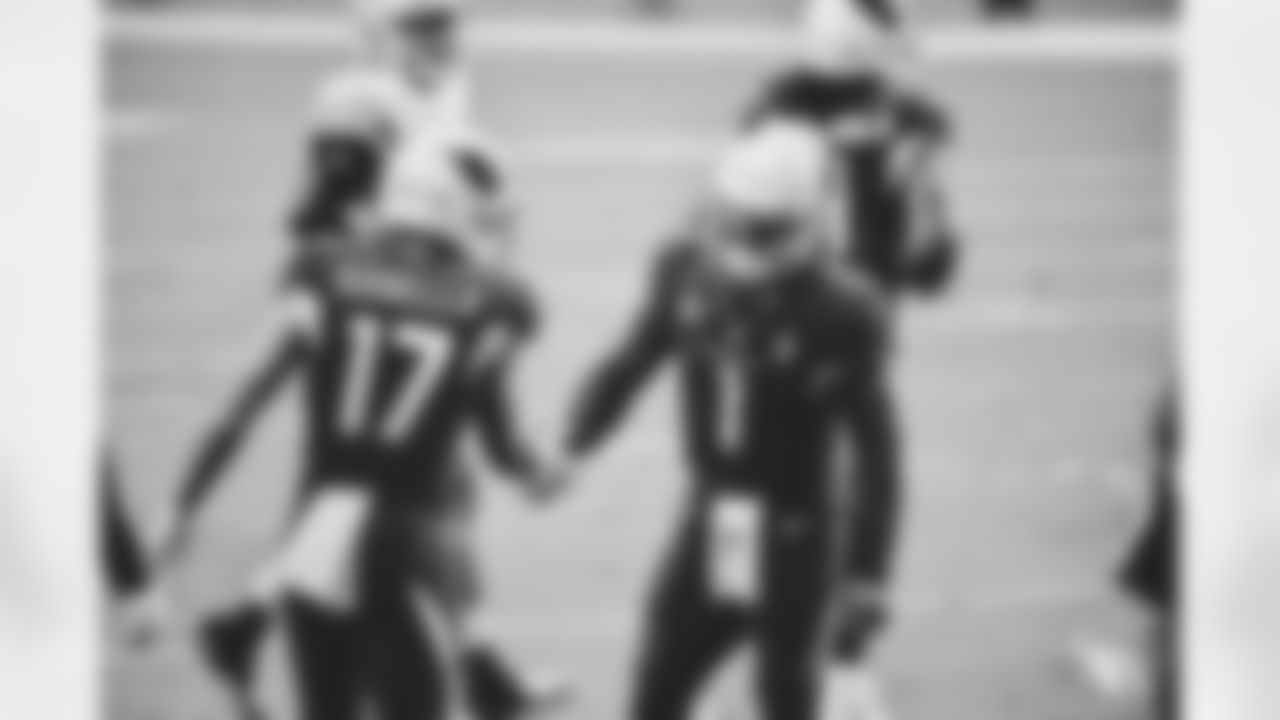 QB Kyler Murray congratulates WR Andy Isabella after they connected on a touchdown.