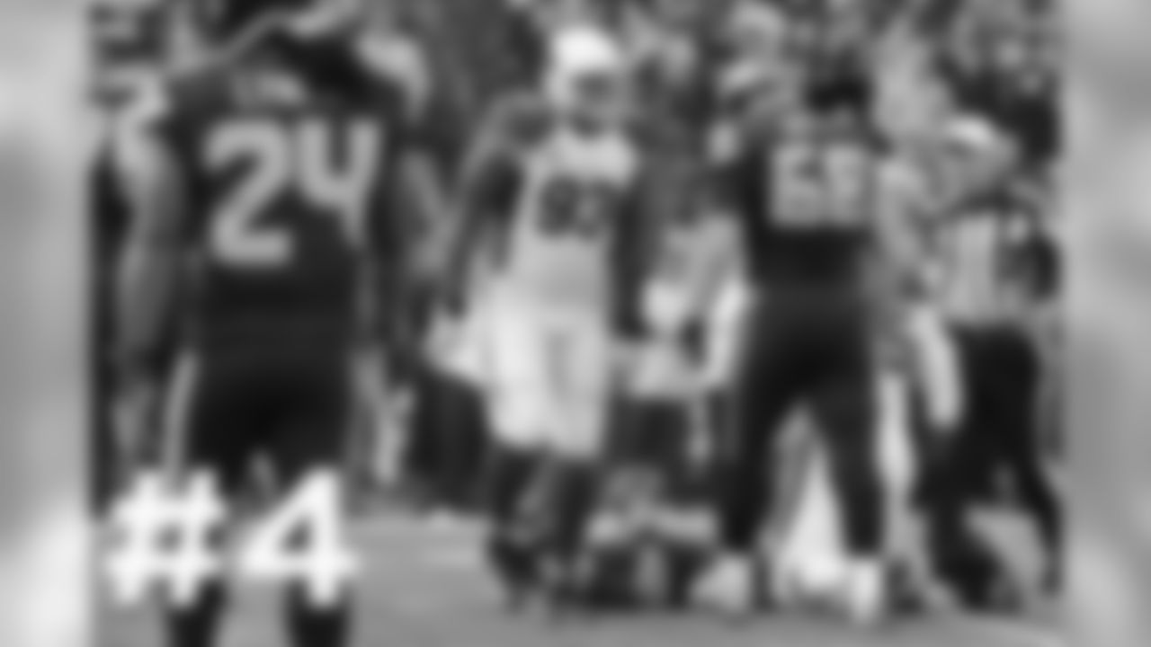 DE Calais Campbell celebrates a takedown of Seattle QB Russell Wilson