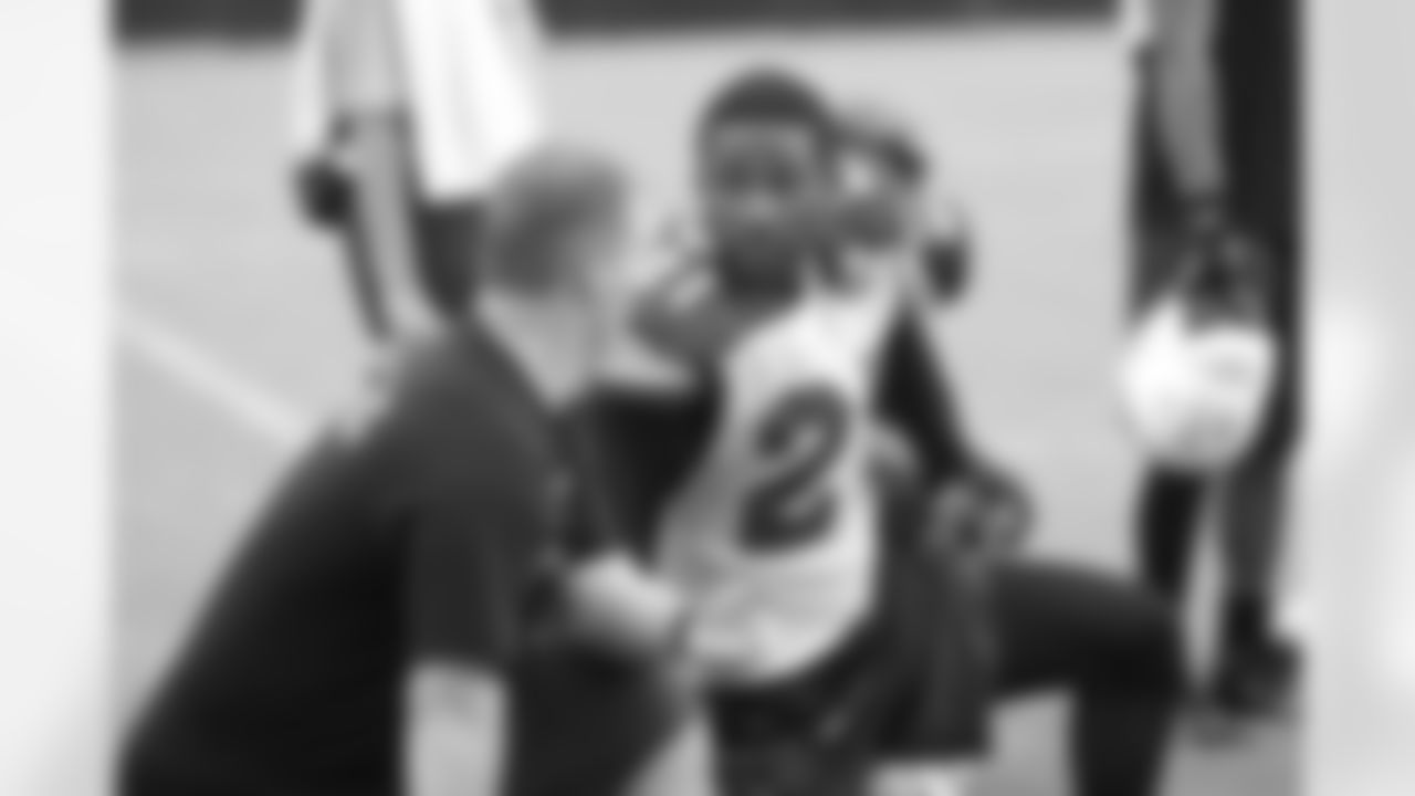 CB Patrick Peterson listens to strength and conditioning coordinator John Lott
