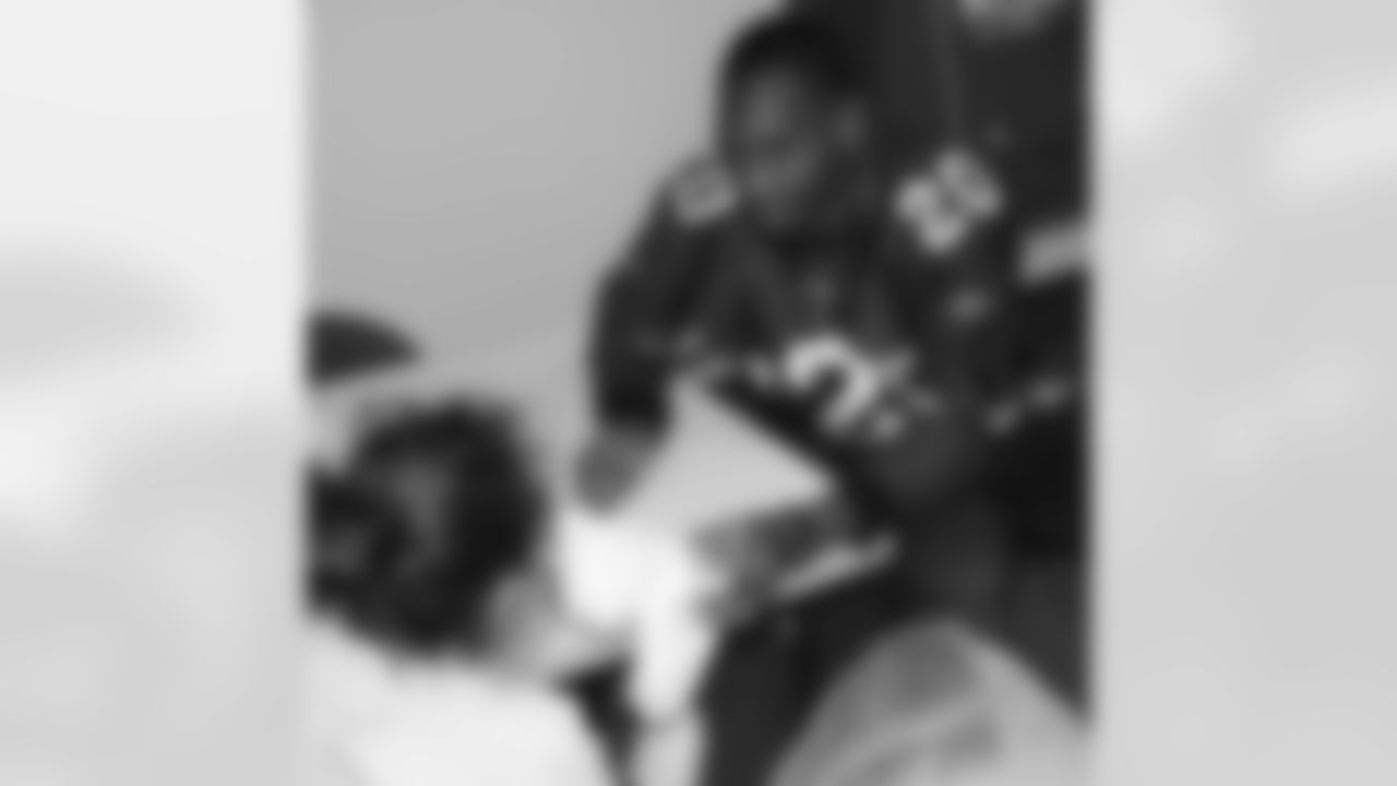 A.J. Jefferson hands out a bear