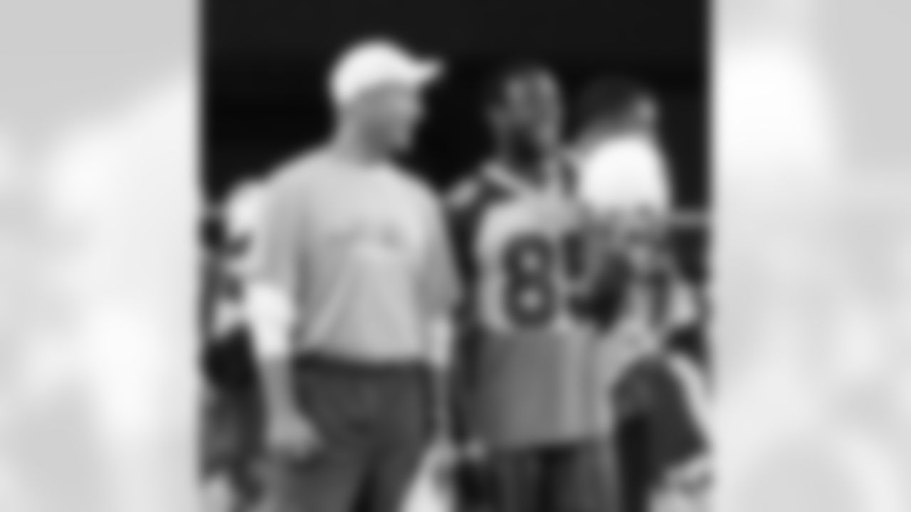 Ken Whisenhunt and Early Doucet share a laugh