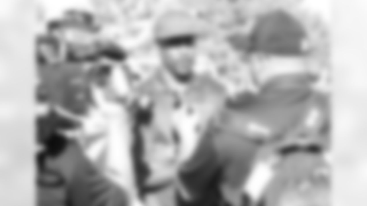 NFL Network analyst Nate Burleson talks to the media