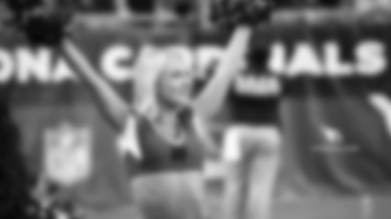 Images of Cardinals cheerleader Davis from the 2018 season