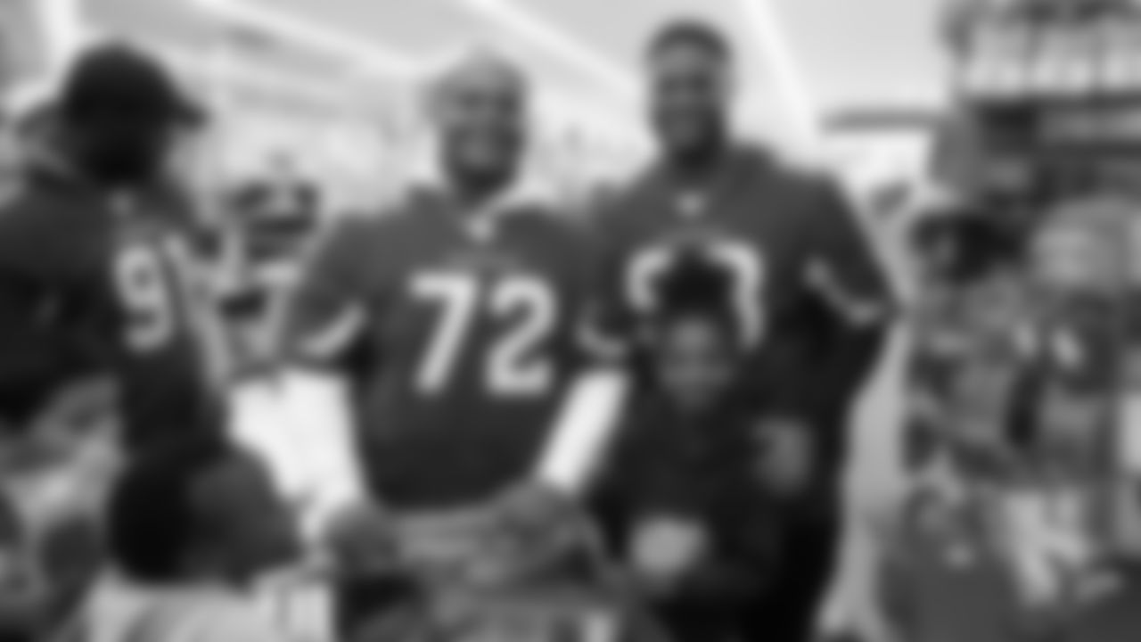 DT Miles Brown (left) and DT Corey Peters at a Shop with a Jock shopping spree.