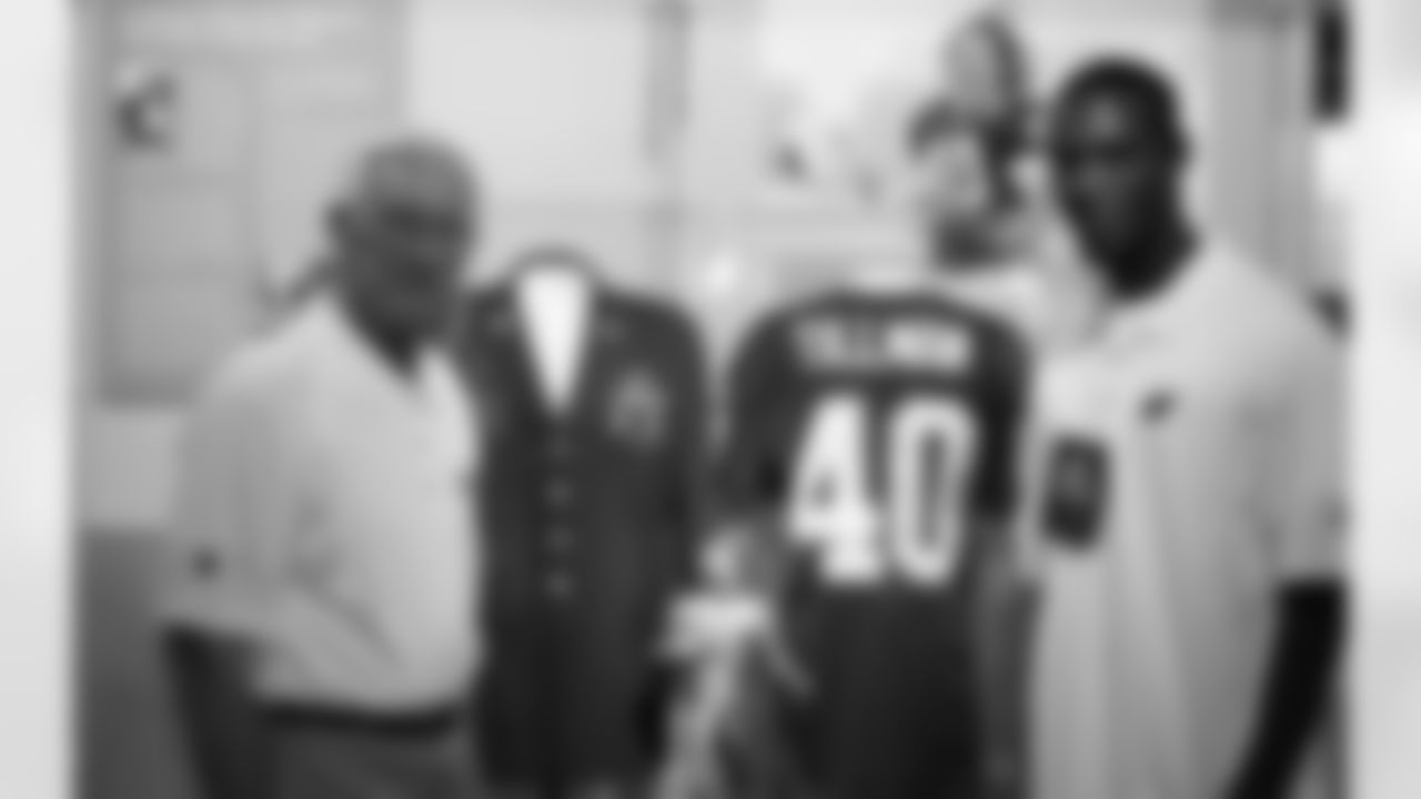 Larry Wilson and Dominique Rodgers-Cromartie by the Pat Tillman exhibit