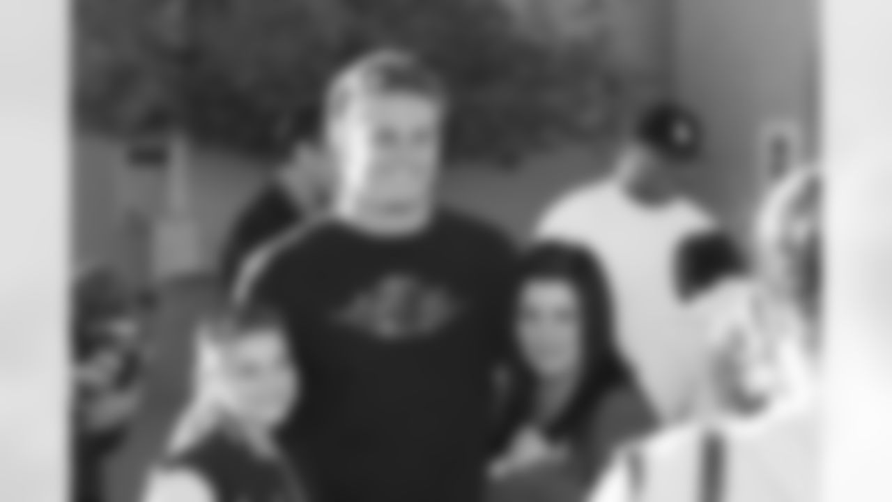 Stephen Spach takes a photo with some fans