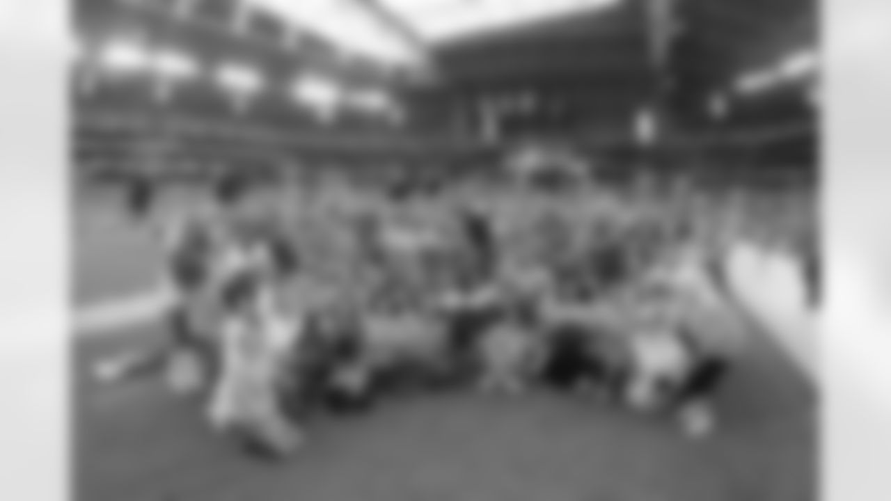 Cheerleadeers with Breast Cancer survivors