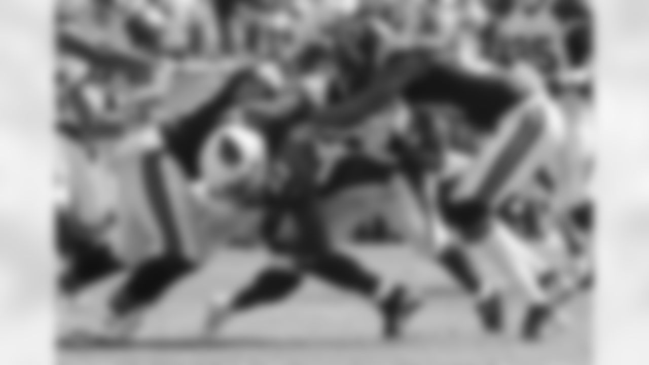 RB Chris Johnson fights for yards