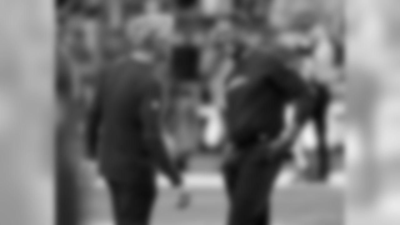 Arizona Cardinals head coach Steve Wilks, right, talks with Seattle Seahawks head coach Pete Carroll prior to an NFL football game, Sunday, Sept. 30, 2018, in Glendale, Ariz.