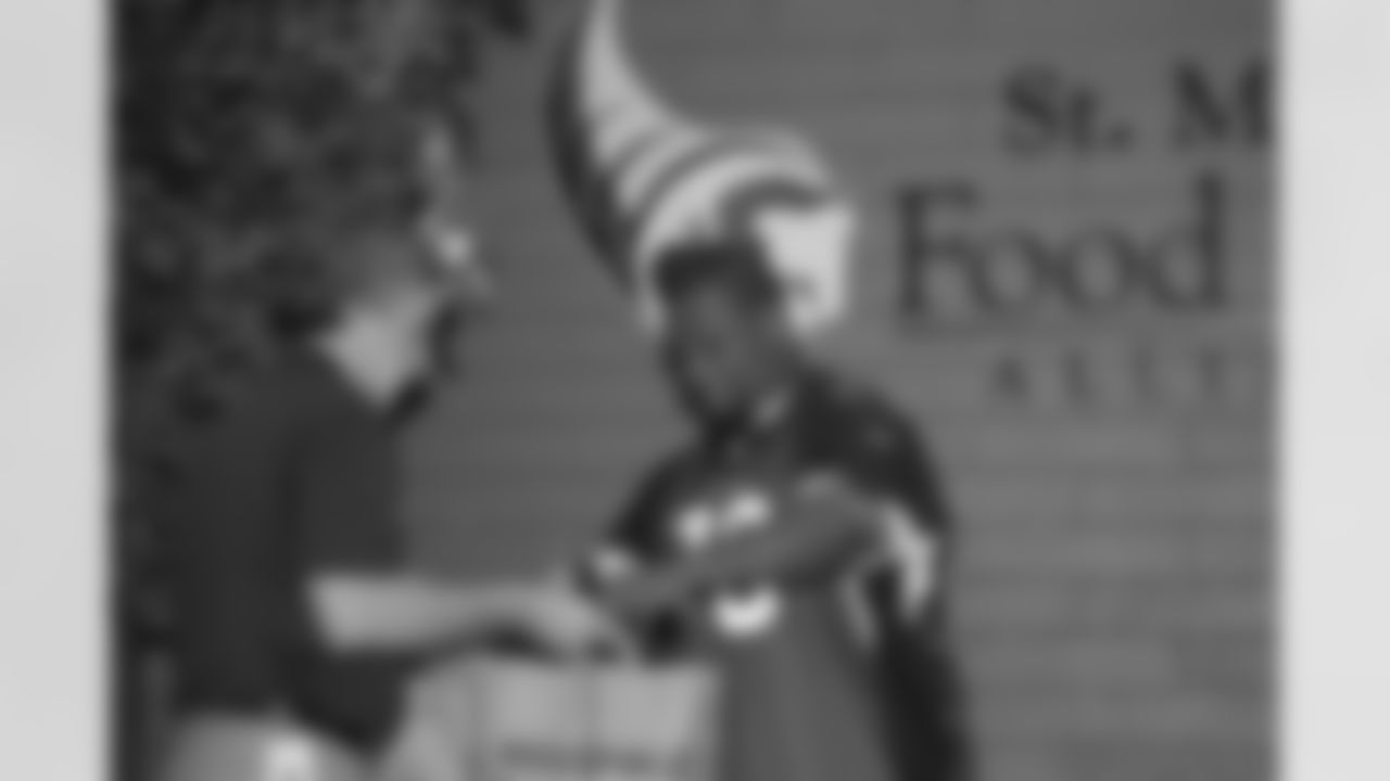 Rex Hadnot lends a hand at St. Mary's Food Bank Alliance