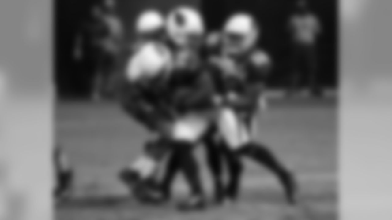 RB Robert Hughes drives forward