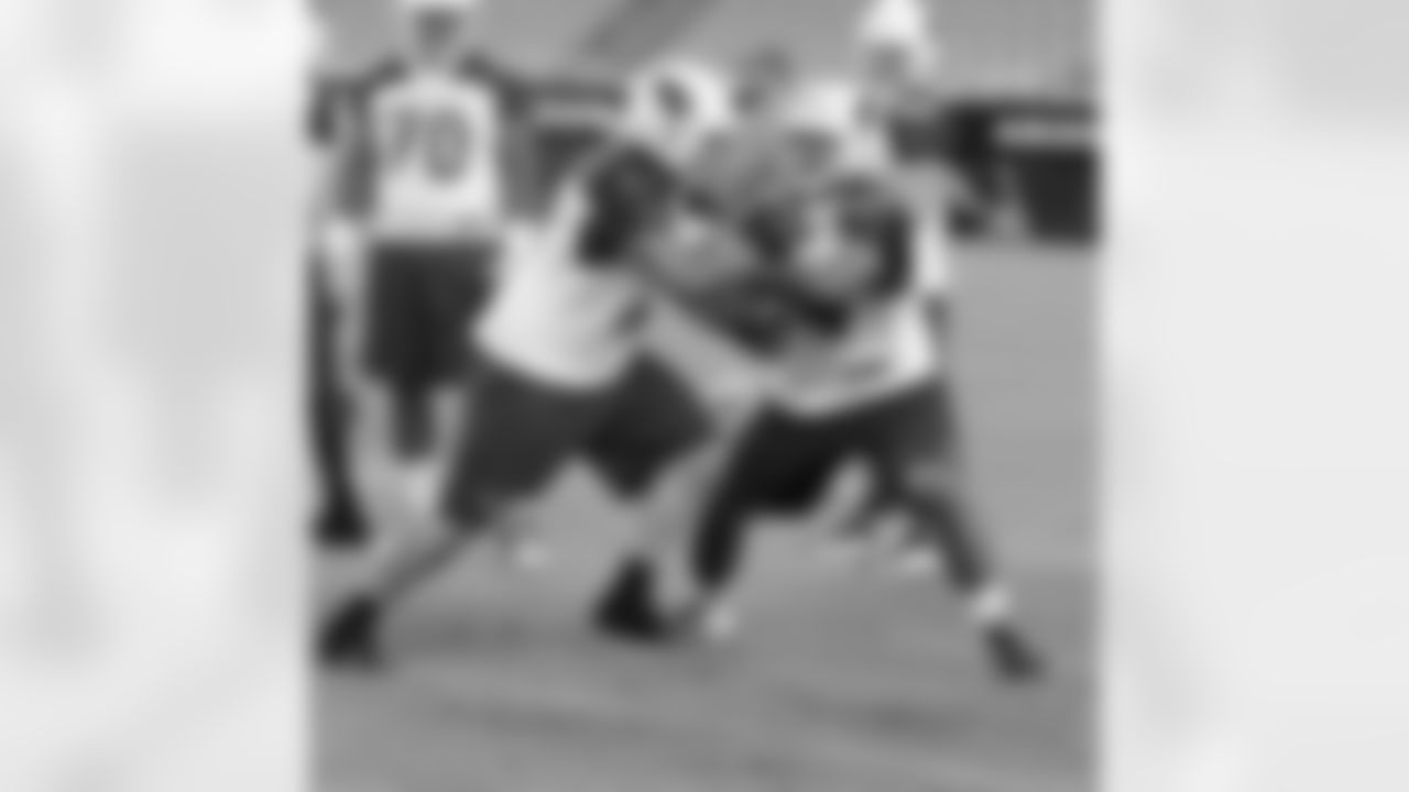 G Senio Kelemete works on technique with Daryn Colledge