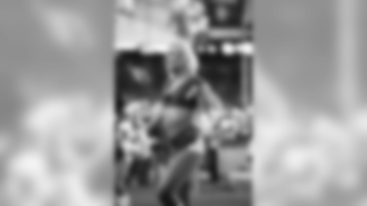 Images of Cardinals cheerleader Davis during the 2019 season