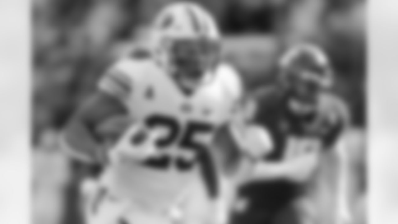 BYU running back Tyler Allgeier carries the ball during the first half of an NCAA college football game against Washington State, Saturday, Oct. 23, 2021, in Pullman, Wash. (AP Photo/Young Kwak)