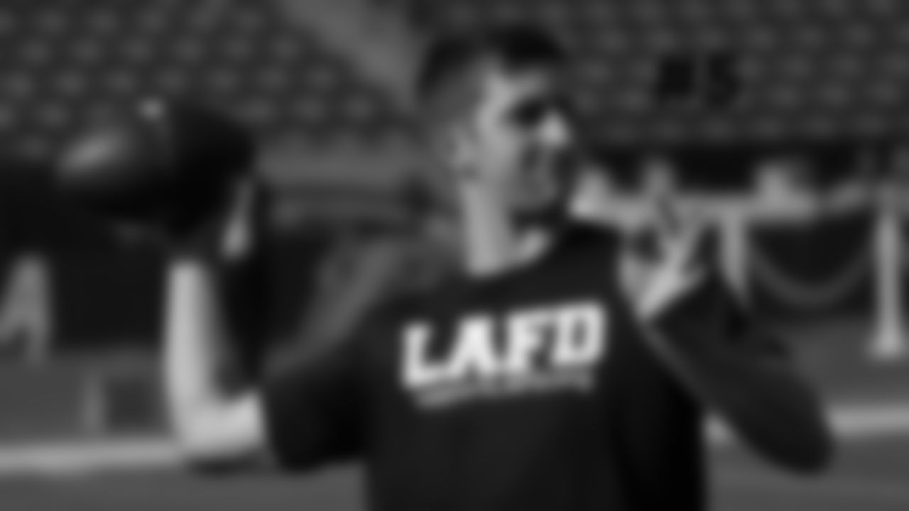 5. QB Josh Rosen wears a shirt in warmups to bring awareness to the California wildfires