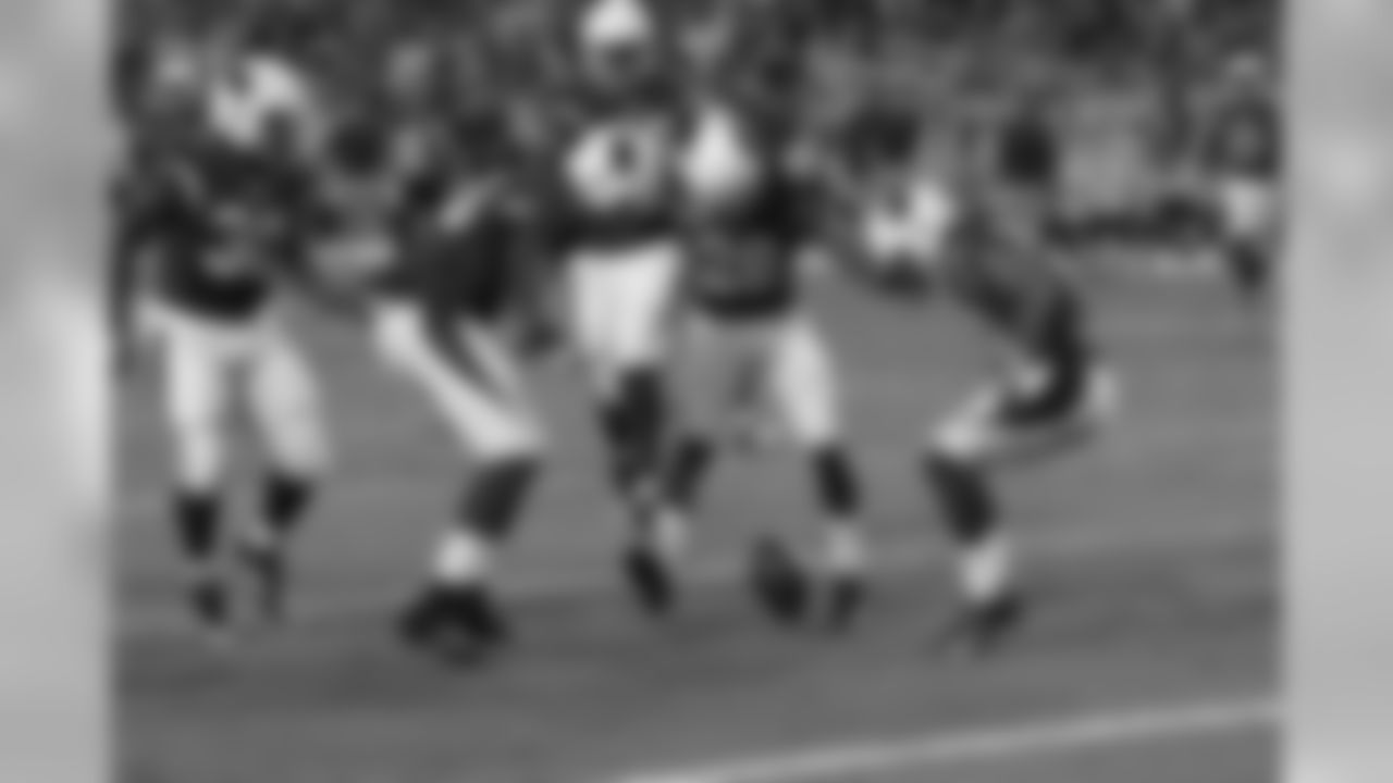 Special teams gather to down a punt inside the five