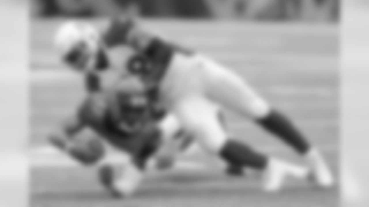 Bengals wide receiver Tyler Boyd (83) is tackled by Cardinals middle linebacker Jordan Hicks (58).