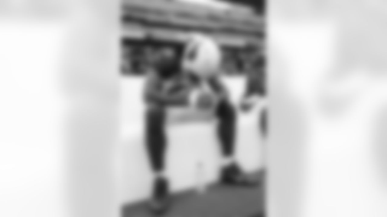 WR Larry Fitzgerald sits on the bench during the Titans game.