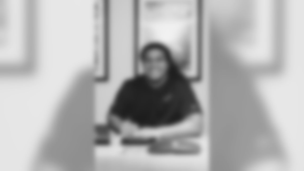 DT Leki Fotu smiles after signing his rookie contract.